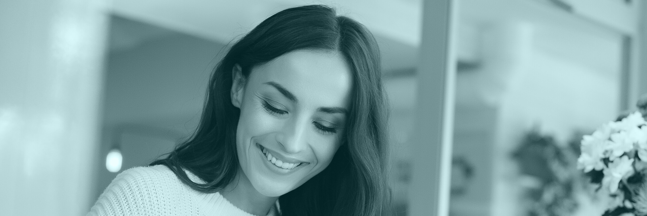 image of a girl smiling looking down