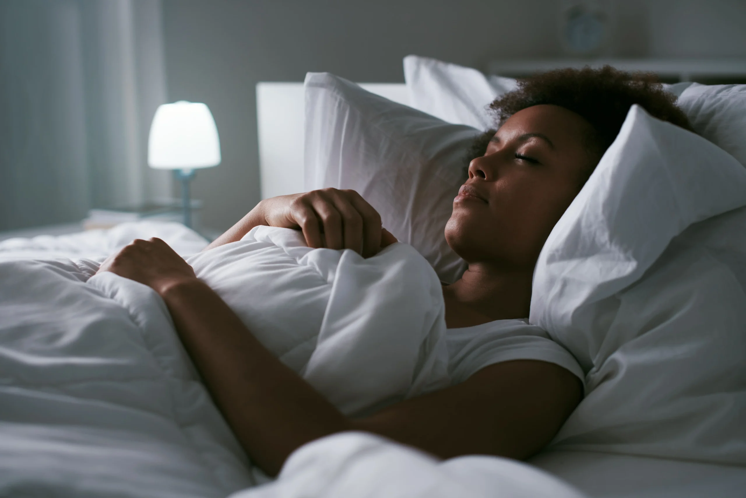 A lady sleeps peacefully after dental surgery